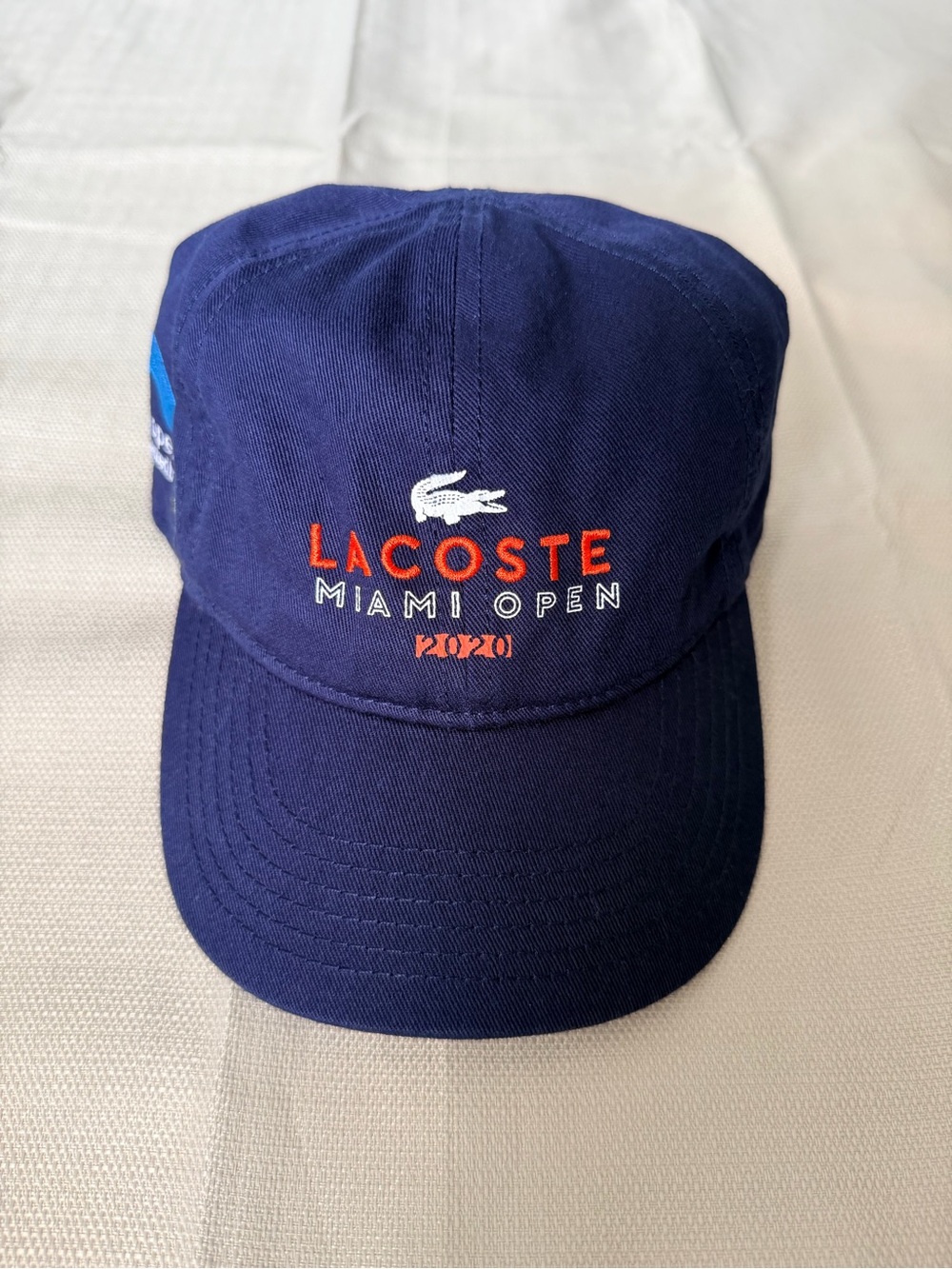 Lacoste Navy Cap with Orange Accent